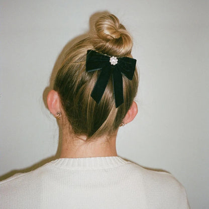 MINI ICONIC VELVET BOW BARRETTE IN NOIR