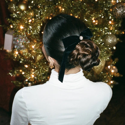 ICONIC VELVET BOW BARRETTE IN NOIR