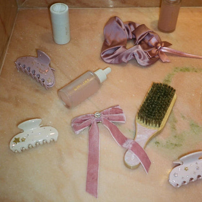 ICONIC VELVET BOW BARRETTE IN BABY MAUVE